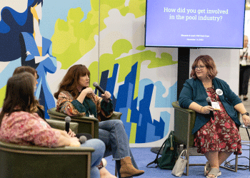 A panel of female pool industry leaders having a discussion on stage at PSP Expo