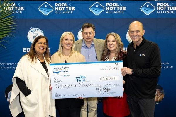 Olympic Gold Medalist Rowdy Gaines and others donating money to Step Into Swim to promote water safety