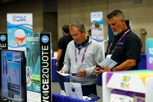 PSP Expo attendees looking at product award entries at PSP Expo 2024