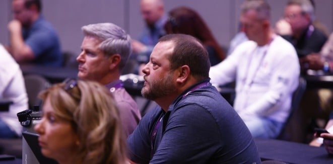 An attentive PSP Expo attendee earning CEUs at the pre-conference