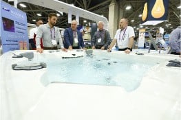 PSP Expo attendees at an exhibitor's booth